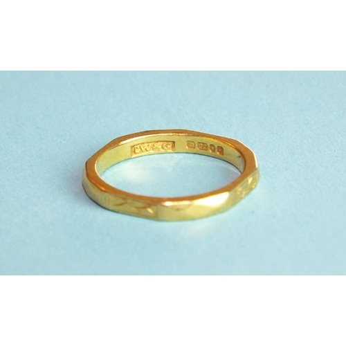 351 - A 22ct gold wedding band of octagonal shape, size L, 3.4g.