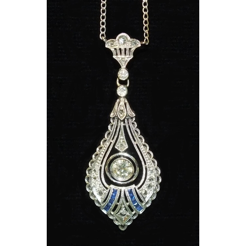 357 - An Art Deco diamond and sapphire 18ct white gold pendant on chain, having a central drop collet-set ... 