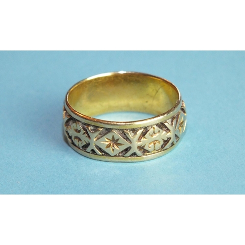 366 - An 18ct yellow gold wedding band with deeply-incised geometric decoration, size N, 4.5g.