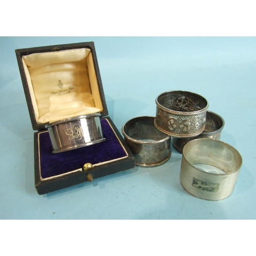 63 - Five various silver napkin rings, one boxed, ___3.15oz.