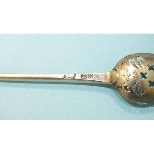 86 - A Georgian silver mote spoon with crosslet and scroll piercing, maker ME, length 13.5cm, 9.3g.