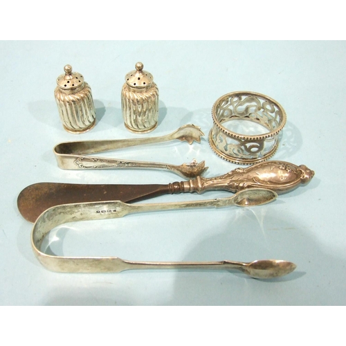 3 - A pair of Victorian fiddle pattern sugar tongs, London 1870, a pair of small embossed  peppers, Birm... 