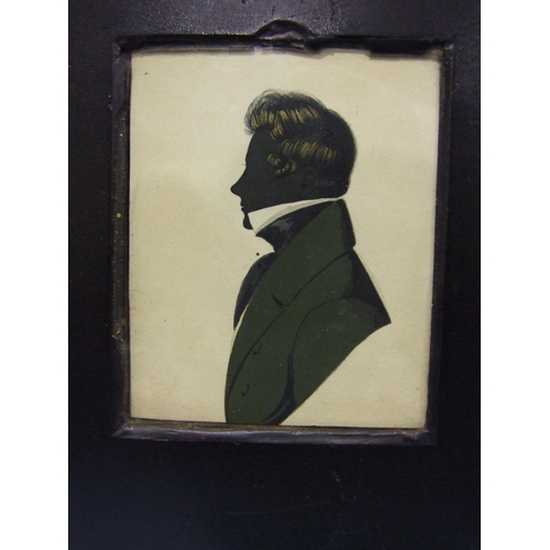 612 - An early-19th century rectangular painted portrait silhouette of E J J G Edwards in black and green ... 