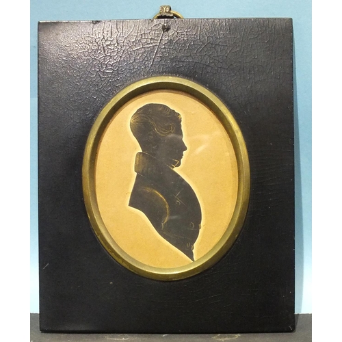 619 - Hill's Gallery, an early-19th century cut silhouette of an unknown gentleman, with bronze embellishm... 