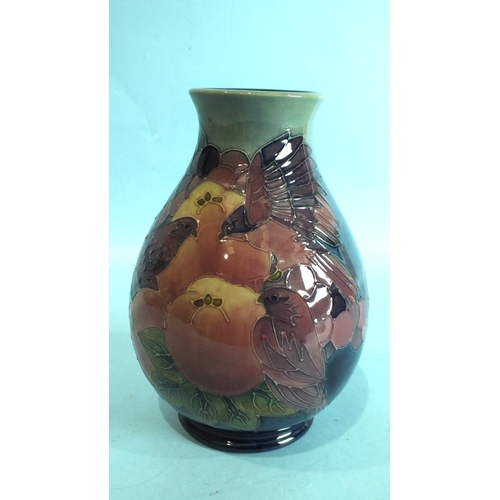 769 - A modern (seconds) Moorcroft baluster pottery vase in the Finches & Fruit pattern, underglaze painte... 