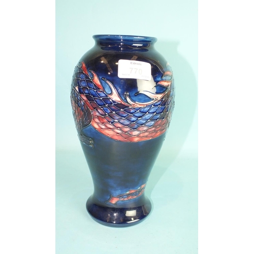 770 - A modern Moorcroft ovular-shaped vase decorated with a dragon on blue ground, 25.5cm high, factory m... 