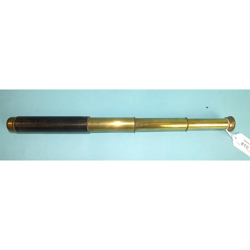 810 - A three-draw brass telescope with leather-covered grip, marked Denhill Venus 18x, 44cm extended and ... 