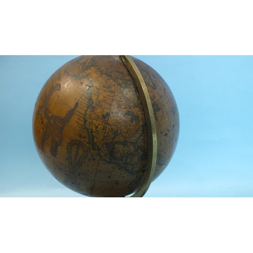 821 - A 19th century Newton's terrestrial table globe, the 5½'' sphere applied with twelve gores, printed ... 