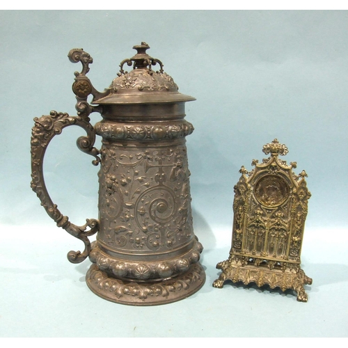 824 - A Continental bronze or brass watch holder of architectural form, cast with arches and caryatid pill... 