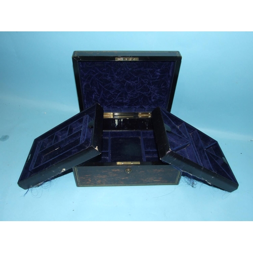 826 - A Victorian Lunds of London coromandel jewellery case, the blue-lined interior with two removable je... 