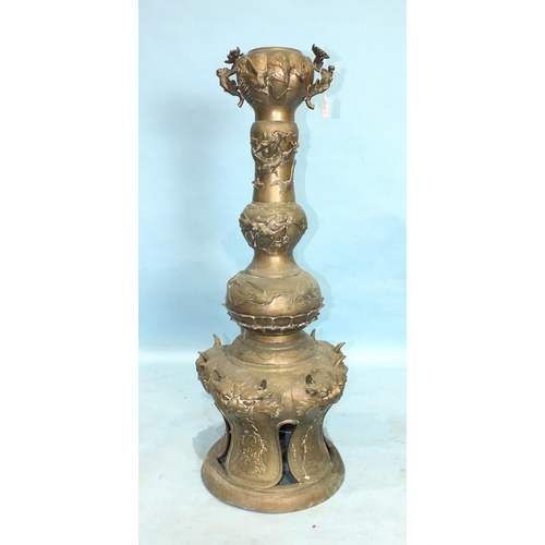 830 - An early-20th century Chinese brass oil lamp base/pedestal of knopped form, applied with dragons, pr... 