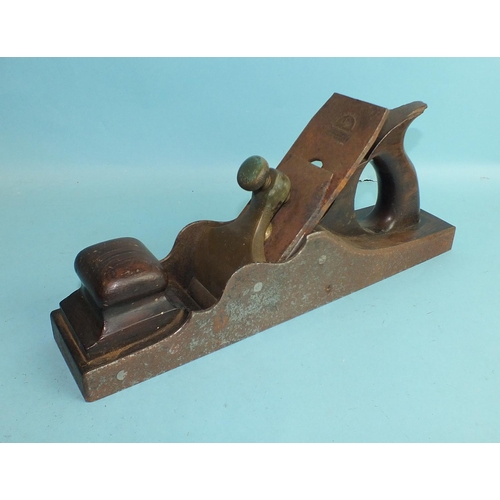 855 - A rosewood and iron block plane with bronze wedge stamped Slaters, Ayr, rosewood infills and Marples... 