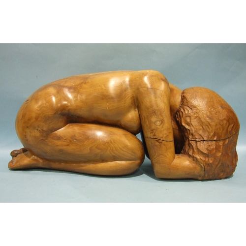 863 - Arthur Morris, a yew carving of a nude woman in a kneeling position and resting her head on her hand... 