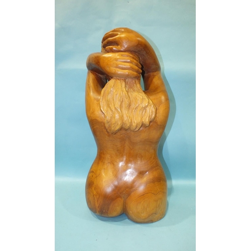 864 - Arthur Morris, a carved wood three-quarter length figure of a nude woman, her hands clasped behind h... 