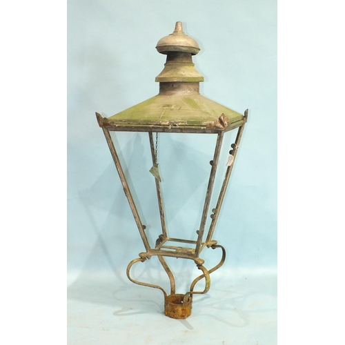 865 - A Victorian copper street lamp hood by Foster & Pullen, Bradford, on cast iron bracket with glass pa... 