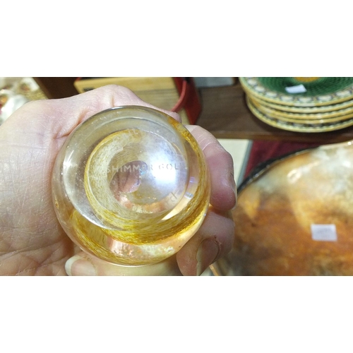 127 - A glass dump paperweight with bubble decoration, 11cm diameter, 9.5cm high, three Caithness glass pa... 