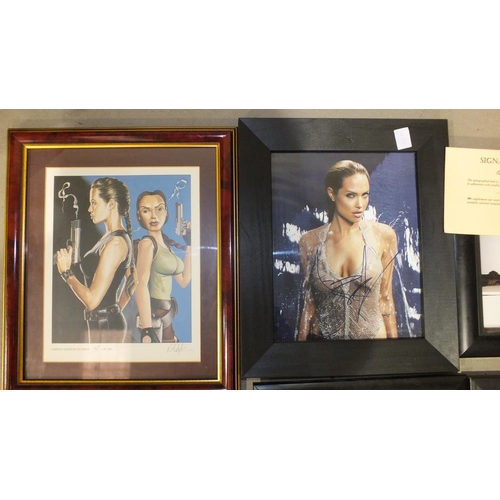 150 - An autographed photograph, Tomb Raider by Angelina Jolie, 19.5 x 24.5cm with COA, a Tomb Raider seri... 