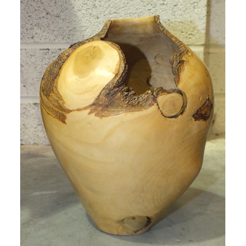 160 - Tim Spencer, a sycamore vase of round form, 20cm high, signed and numbered 97/145, another holly ves... 