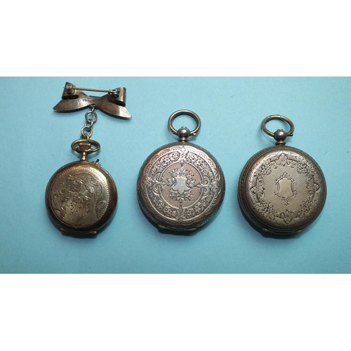 234 - A lady's Continental silver-cased keyless pocket watch with floral engraved back, suspended on sterl... 