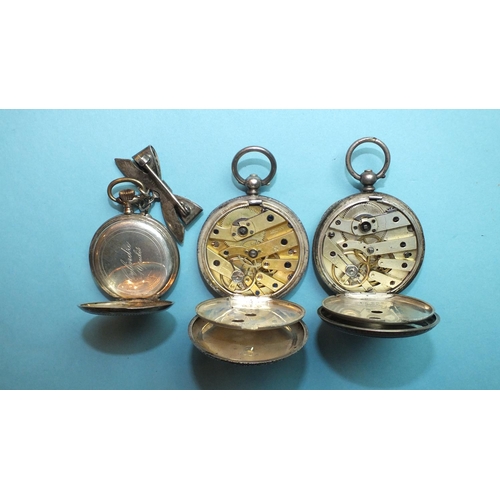 234 - A lady's Continental silver-cased keyless pocket watch with floral engraved back, suspended on sterl... 