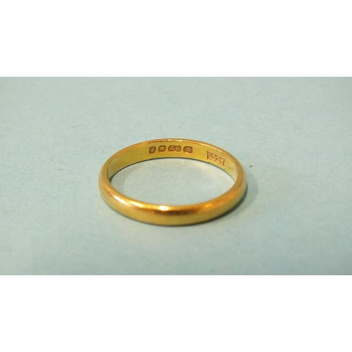 239 - A 22ct gold wedding band, size K, 2.4g.