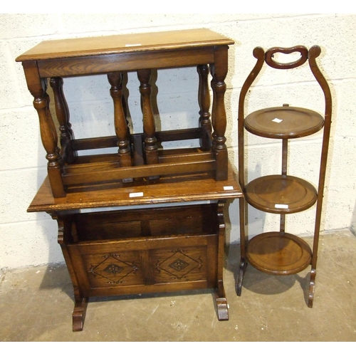 64 - An oak magazine rack/table, a nest of oak tables and a mahogany folding cake stand. (3).