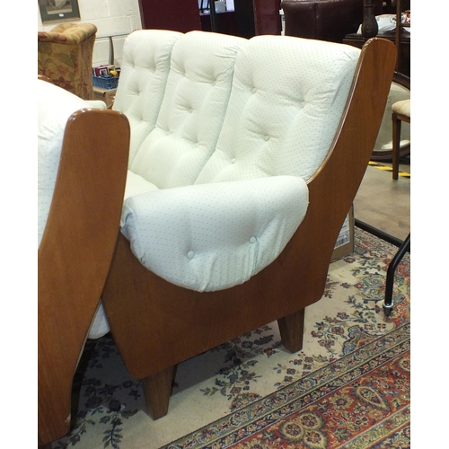 13 - A 1970's G-Plan 'Saddle' three-piece hardwood and upholstered suite, short legs added to, with foot ... 