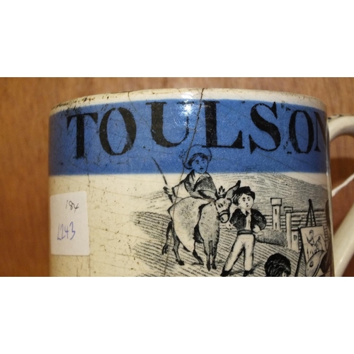 184 - A 19th century Staffordshire mocha ware mug decorated with children playing and with the name 'Annie... 