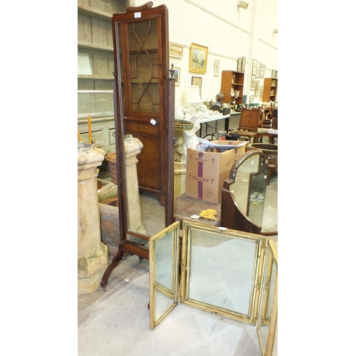 22 - A 20th century mahogany cheval mirror, 161cm high and a painted wood triptych mirror, 54cm high.... 