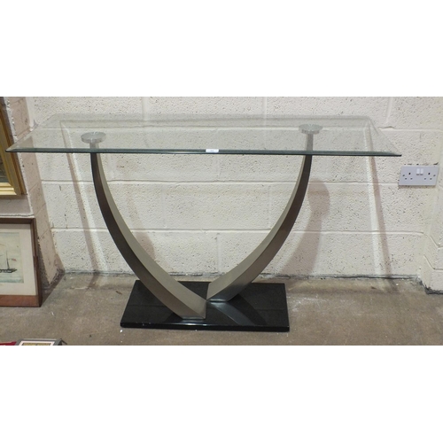 45 - A modern aluminium and plate glass hall table, the top 123 x 46cm, 77cm high and two Victorian paint... 
