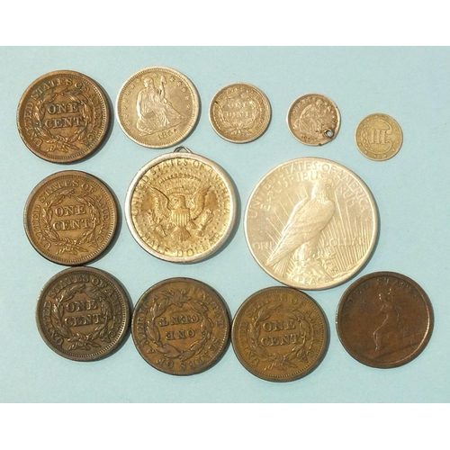 137 - USA, a collection of coins: a 1783 Washington Independence token, an 1853 three-cents, an 1855 one-d... 