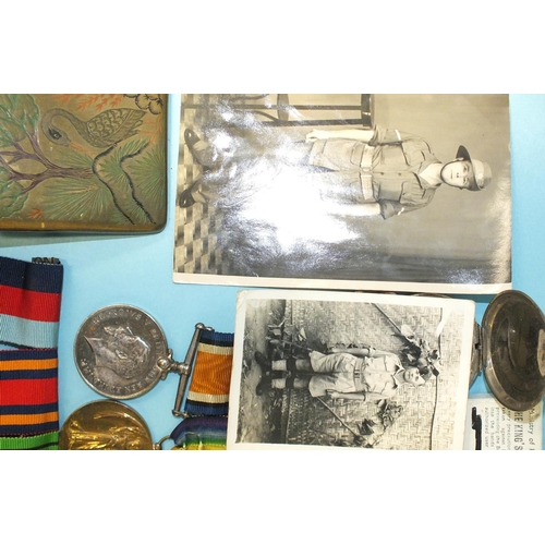 166 - A father/son group comprising: a WWI/WWII group of three medals to 31858 Pte A Green DCLI: British W... 