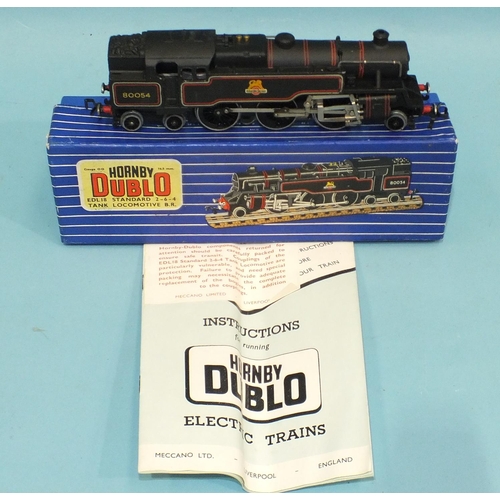 304 - Hornby Dublo, five boxed coaches: D12 Corridor Coach (x3), D13 and D14 Suburban Coaches and three bo... 