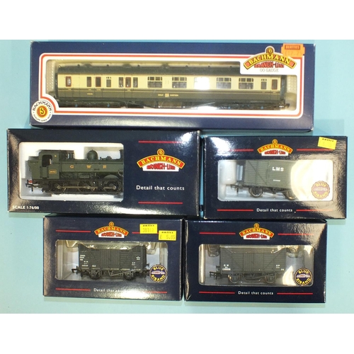 317 - Bachmann OO gauge, 32-200 GWR 0-6-0 Pannier tank locomotive, a GWR coach and three wagons, (all boxe... 