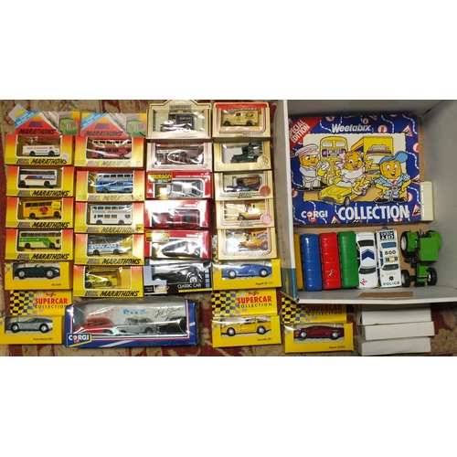 445 - A quantity of boxed diecasts by Burago, Lledo, Maisto, Corgi, etc, a Kenner 1980 Snowspeeder and oth... 