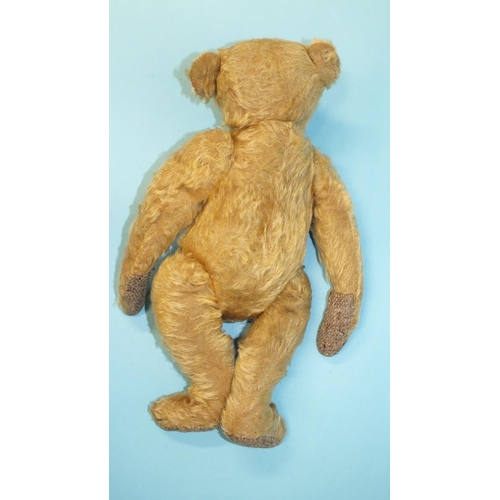 466 - A small early Steiff blonde mohair teddy bear with boot-button eyes, 