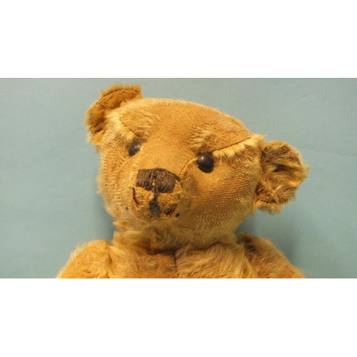 466 - A small early Steiff blonde mohair teddy bear with boot-button eyes, 