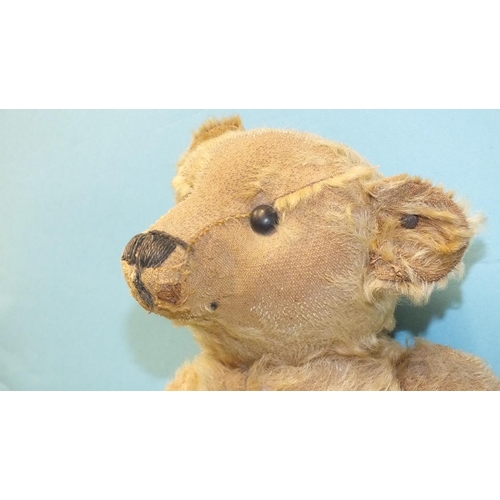 466 - A small early Steiff blonde mohair teddy bear with boot-button eyes, 