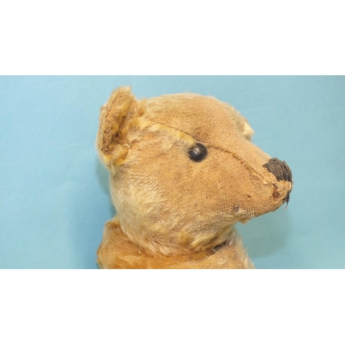 466 - A small early Steiff blonde mohair teddy bear with boot-button eyes, 