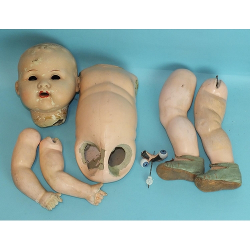 467 - An Armand Marseille bisque doll's head marked 390n A4/OM, (eyes a/f) and four bisque baby dolls, (th... 