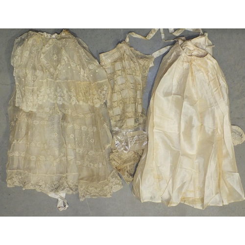 504 - A quantity of Victorian silk and cotton baby clothes bearing the label Christening suit as worn... 