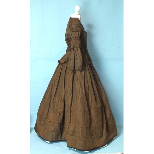 511 - A Victorian brown silk hand-stitched two-piece day dress c1860, the boned bodice with front opening,... 