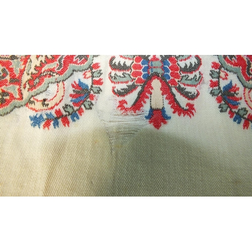 514 - A cream Paisley shawl with woven border and flower sprays and silk fringing, (153 x 155cm excluding ... 