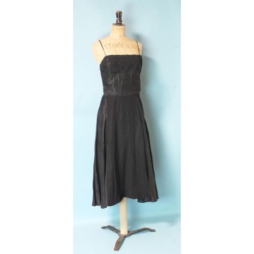 525 - A vintage black silk chiffon and lace evening dress with silk slip, size UK12 approximately, a black... 