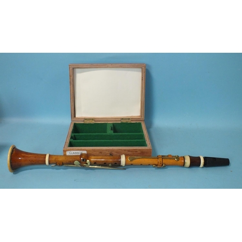 542 - A classical boxwood and ivory clarinet in B♭, with brass keys and rosewood barrel, stamped Bilton, L... 