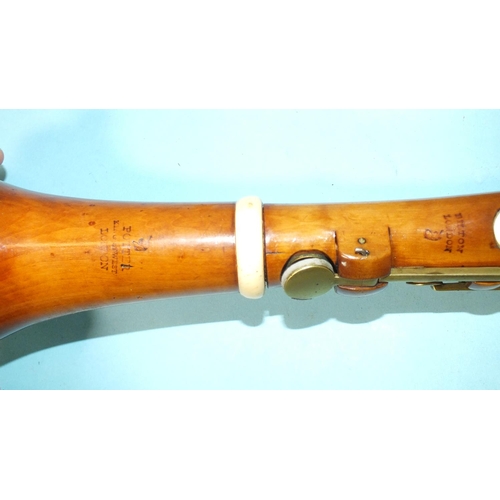 542 - A classical boxwood and ivory clarinet in B♭, with brass keys and rosewood barrel, stamped Bilton, L... 