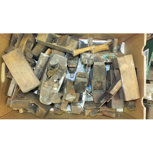 570 - A collection of wooden moulding and other planes, large wood wedges, a metal-bound box and a brass 2... 