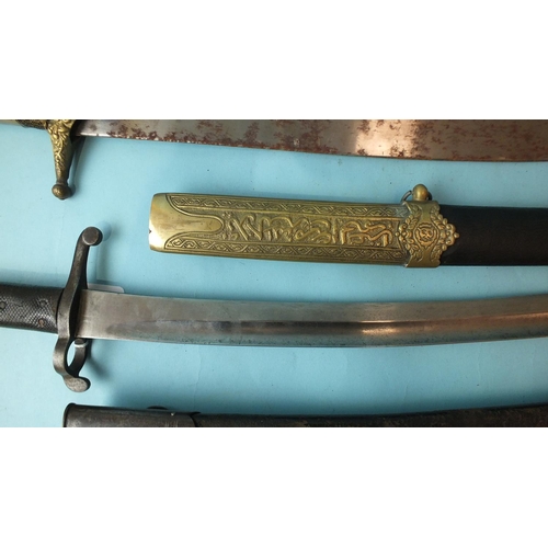 583 - A 19th century British 1856/58 pattern Enfield sword bayonet, with 58cm blade, chequered leather gri... 