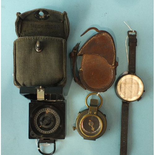 591 - A T.G. Co. Ltd military magnetic marching compass Mark I, no. B70039, together with a WWII Russian m... 