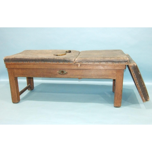 101 - An early-19th century oak-framed gynaecologist's couch, with mechanical action and winding handle 17... 